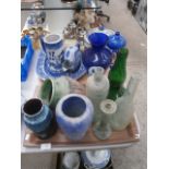 2 tray inc blue and white pottery and coloured glassware