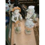 pair of bisque figurines - the apple pickers