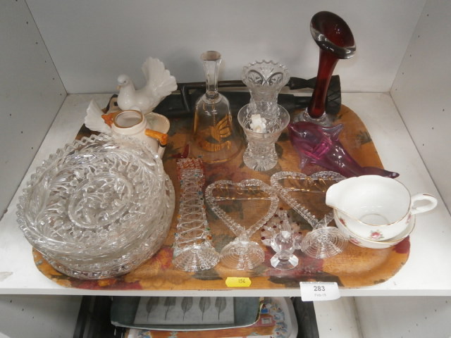 tray of white and coloured glass and pottery