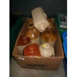 box of stonware bottles and warmers