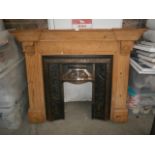 cast fire with wooden surround