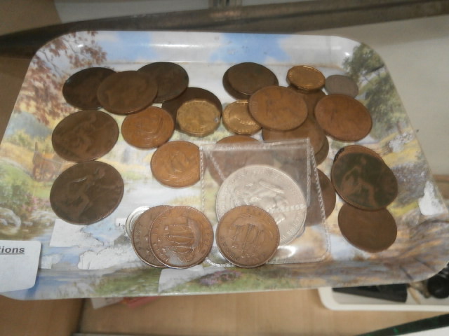 tray of old pennies and coins