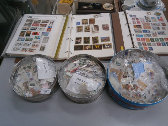 3 albums and tins of stamps