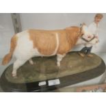 country artists bull figurine ( crack on tail)