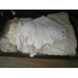 Box of crochet mats and linen