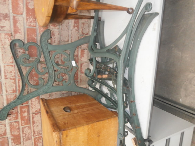 2 pairs of green cast iron bench ends