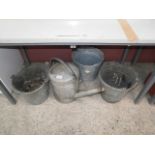 3 galvanized buckets and watering can