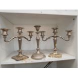 2 3 armed candelabras and candle stick