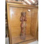 carved Asian figurine in display case, glass a/f