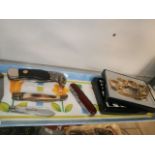 tray inc. penknives ( one silver) and bear claw belt buckle