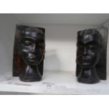 pair of carved dark wood bookends