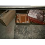 3 vintage suitcases