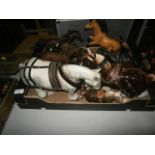 box of horse figurines