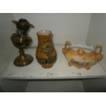 brass oil lamp, german wine jug and a planter