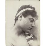 Gloeden, Wilhelm von: Portrait of a boy with headband Portrait of a boy with headband. Circa 1899.