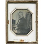Daguerreotypes: Portrait of a man with top hat on table Photographer: Joseph Wen(n)inger (b.