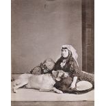 Ermakov, Dimitri N.: Georgian woman with her dog Georgian woman with her dog. 1880s. Albumen
