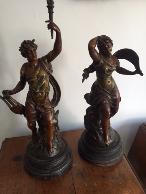 A Pair of late C19th /early C20th spelter figures of ‘Night and Day’ n turned treen supports