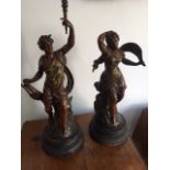 A Pair of late C19th /early C20th spelter figures of ‘Night and Day’ n turned treen supports