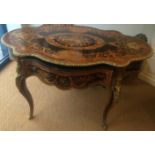 A late C19th French Louis XIV style marquetry inlaid oval Centre table. The fine mixed wood