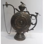 A C19th Indian rosewater white metal silver tested ewer With parot tipped cover with incised and