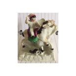 A collection of three English porcelain C19th figure groups one of child riding pony, cat group