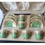 A Royal Worcester 6 piece cased coffee service with matching jug H8.5cm W8.5cm D5cm and sugar bowl