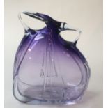 A beautiful hand blown smokey purple art glass twin handled vase. Signed bottom right H24cm W17cm