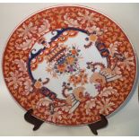 A large Chinese Republic period charger and stand with central floral motif surrounded by phoenix
