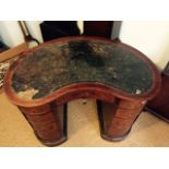 An Edwardian Ladies kidney shaped mahogany, satinwood and boxwood desk