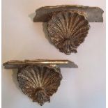 A pair of carved giltwood wall brackets with shell supports H16cm W30.5cm