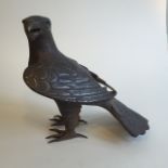 A C19th Indian bidriware silver inlaid figure of an eagle H22cm L25cm