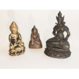 A collection of three C19th or later Indian/Tibettan bronze seated Buddhas in crosslegged medative