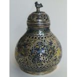 A C19th Indian enamelled Lucknow Huqqa top, the pierced bulbous vessel decorated with paradisiacal