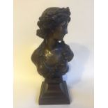 A fine cast numbered bronze of a beautiful maiden adorned with floral garland on shaped stepped base