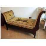 An early C19th mahogany French Day bed / ‘Recamier’ in the Empire style, the scrolling ends with