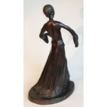 An Art Deco style bronze figure of a robed dancer