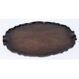 A Georgian mahogany piecrust tray: of ov