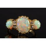 An 18ct gold, opal and diamond seven-sto