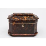 A 19th century tortoiseshell tea caddy: