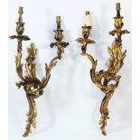 A pair of  gilt metal acanthus twin bran