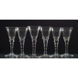 A set of six English wine glasses: each