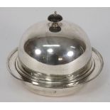 A George V silver muffin dish and cover,