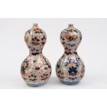 A pair of Japanese Imari porcelain vases
