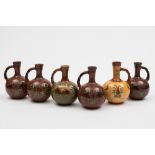 Six Watcombe (Torquay) pottery ewers: of