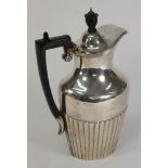 A late Victorian silver hot water jug, m