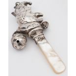 A George V silver rattle, maker's mark w