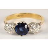 An 18ct gold, sapphire and diamond three