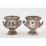 A pair of Edwardian silver plated wine c
