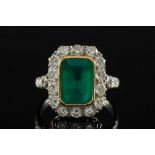 An emerald and diamond rectangular clust